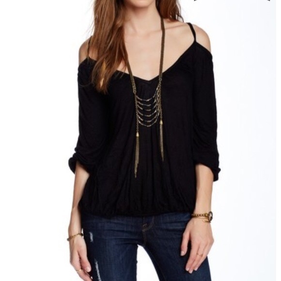 black shoulderless top